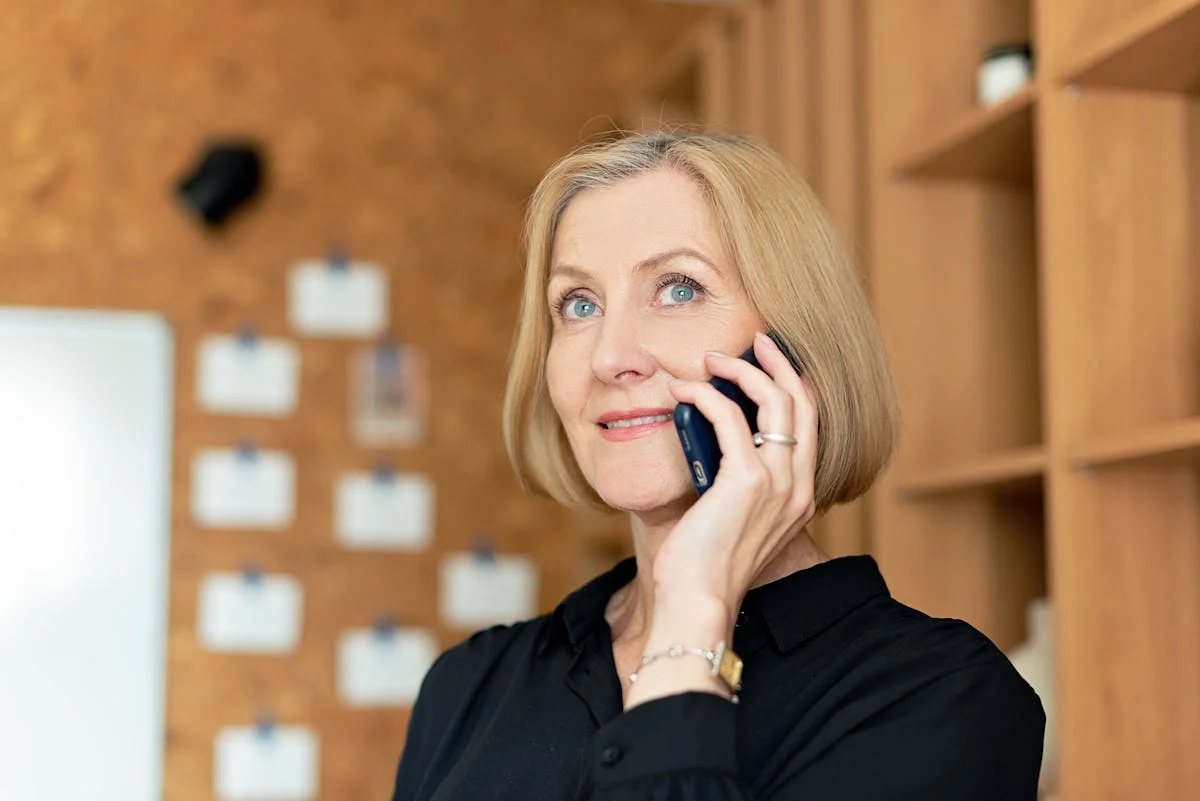 Moving company employee answering customer phone call