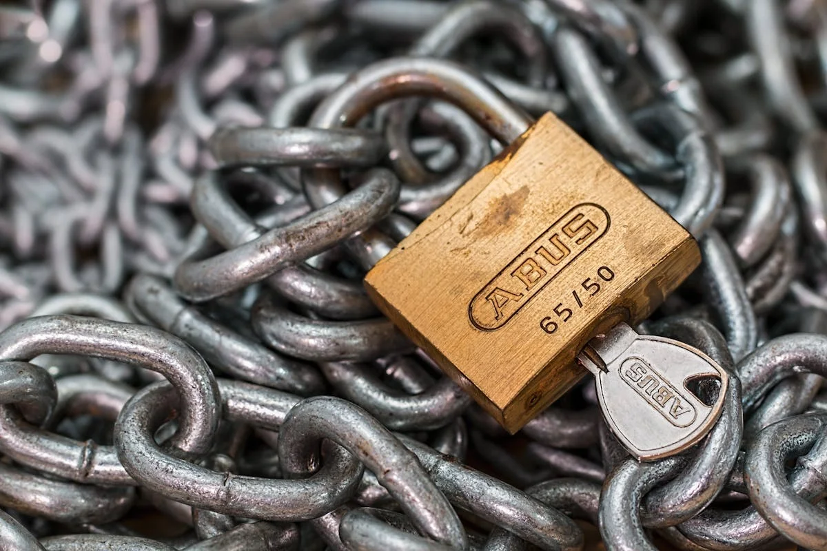 Gold padlock with chains symbolizing SSL certificate protection for websites